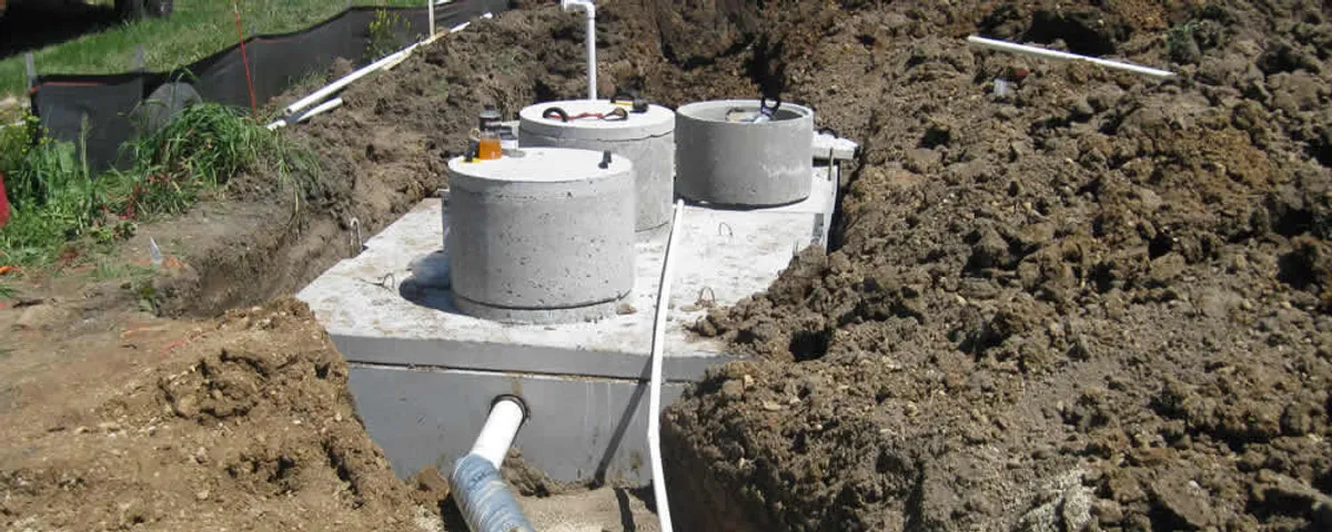 Septic system repair and installation site with tank access ports in Memphis, TN