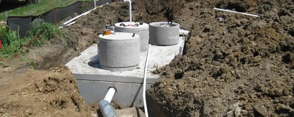 Septic system repair and installation site with tank access ports in Memphis, TN